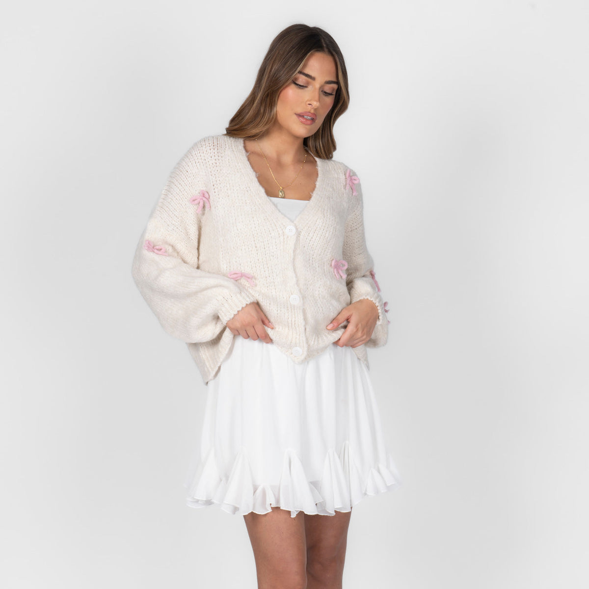 Cleo | Cárdigan oversize con mini lazos