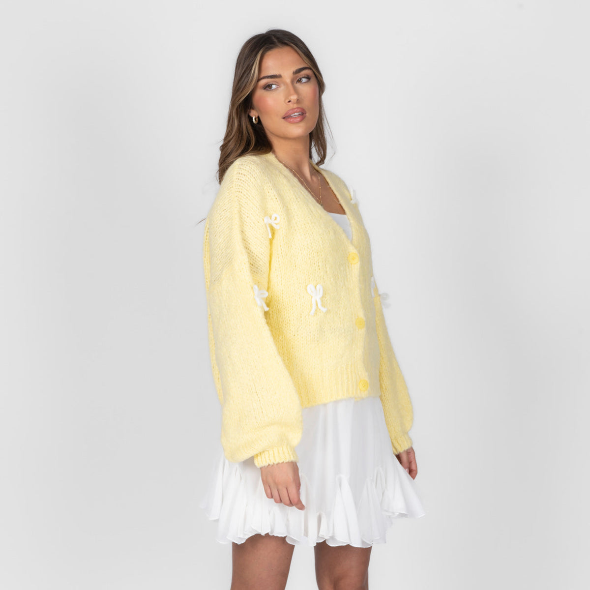 Cleo | Cárdigan oversize con mini lazos