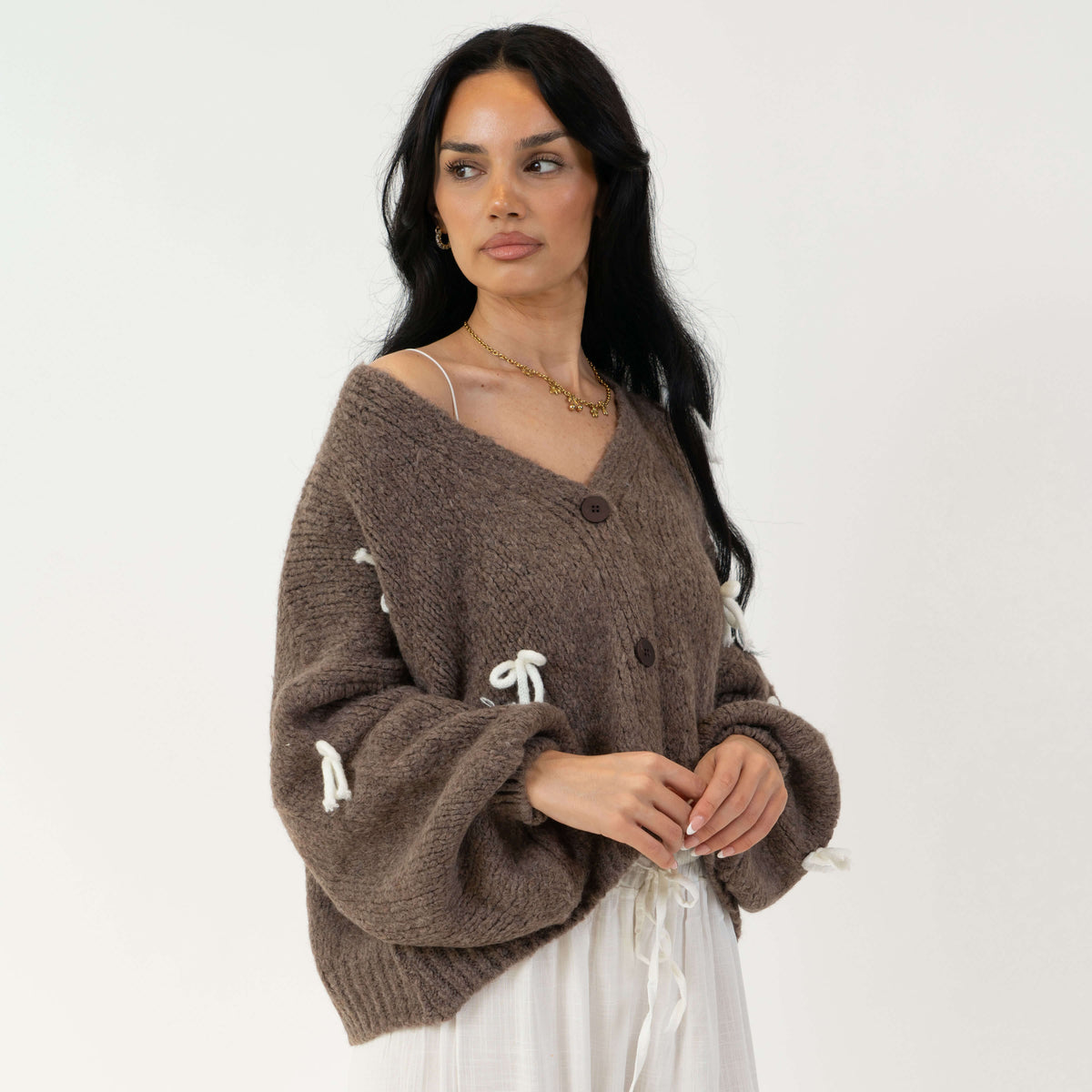 Cleo | Cárdigan oversize con mini lazos