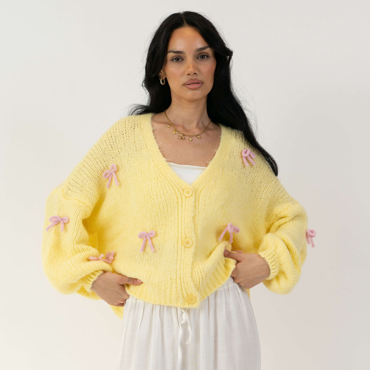 Cleo | Cárdigan oversize con mini lazos