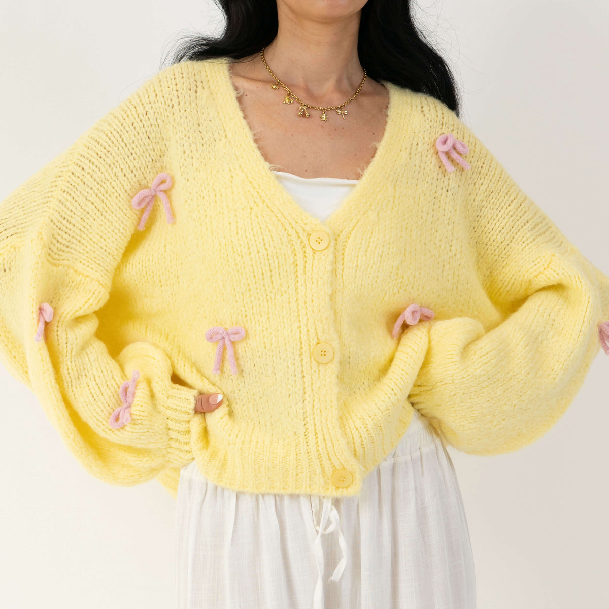 Cleo | Cárdigan oversize con mini lazos