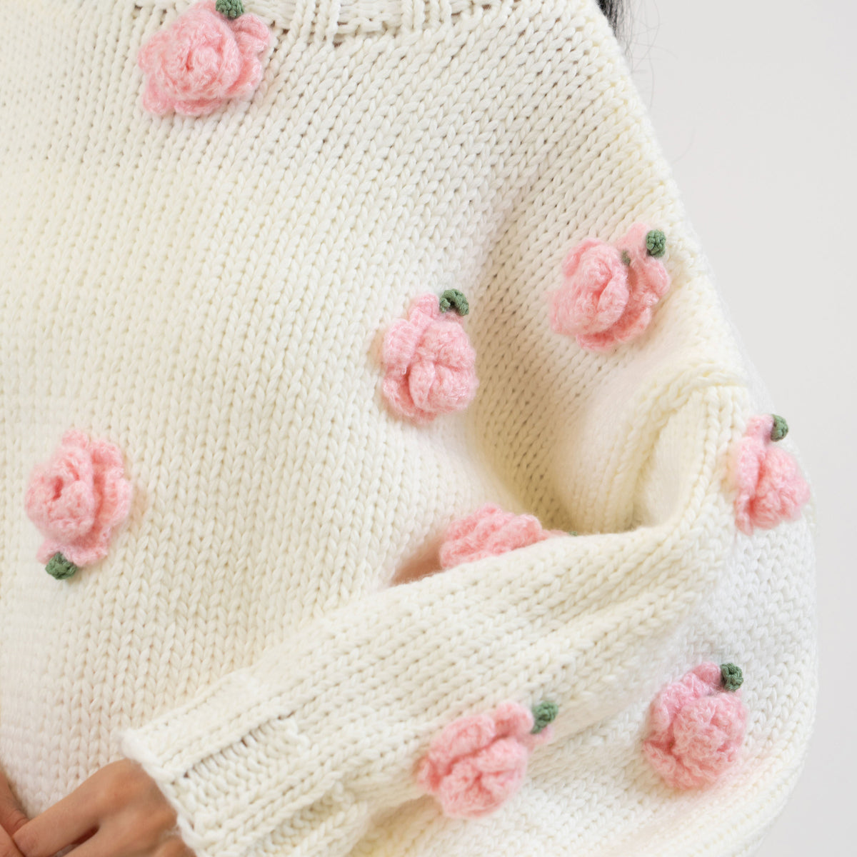 Camelia | Jersey con rosas en relieve