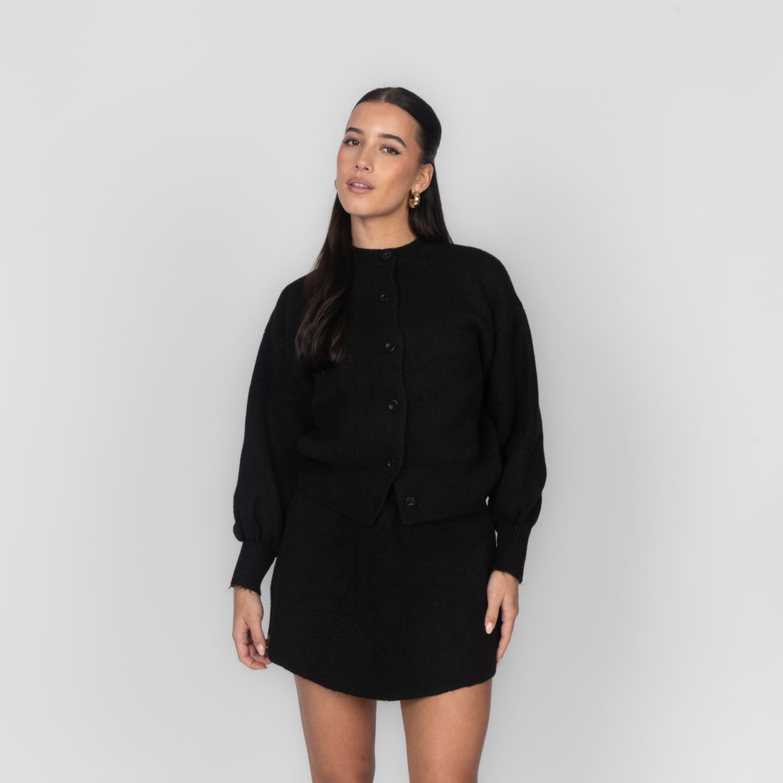Sofía | Conjunto de cárdigan y minifalda de punto