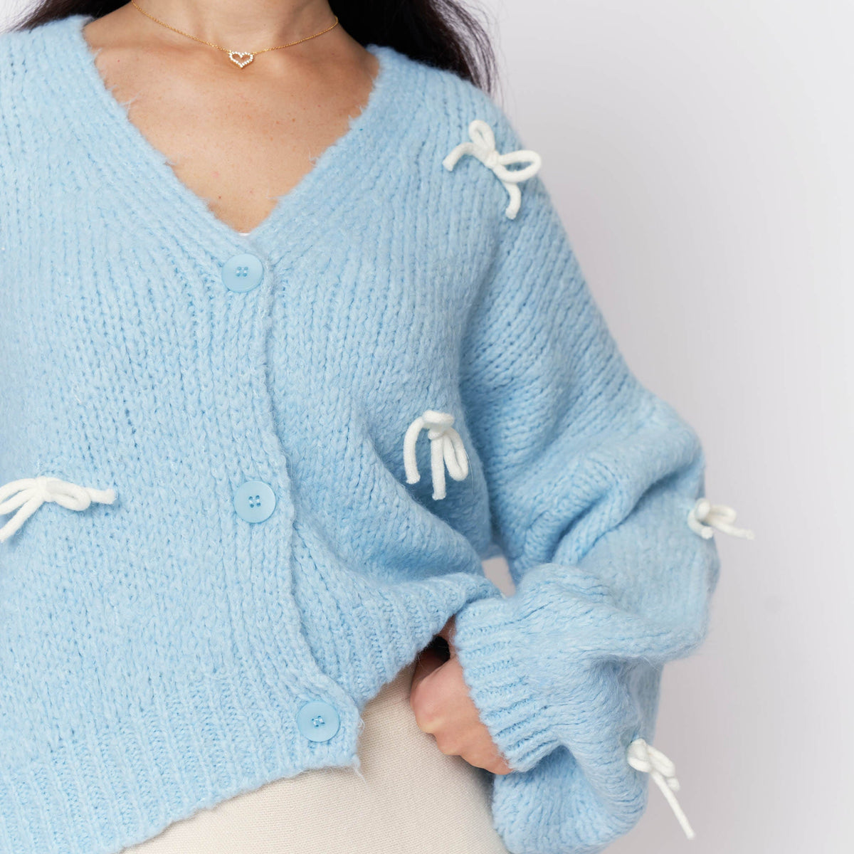 Cleo | Cárdigan oversize con mini lazos