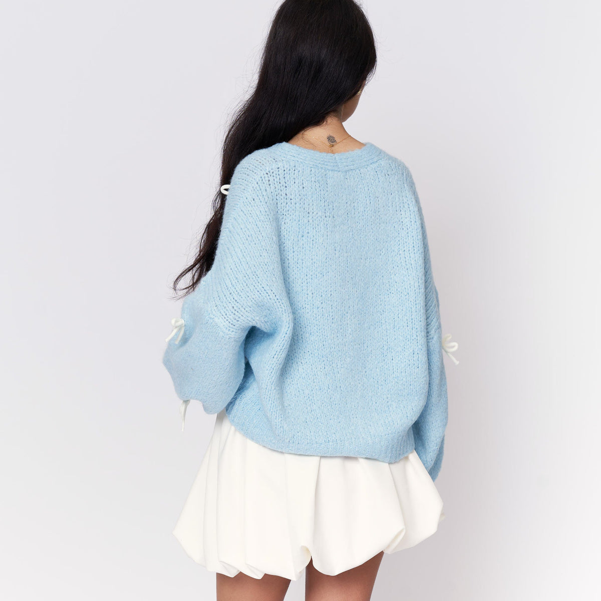 Cleo | Cárdigan oversize con mini lazos