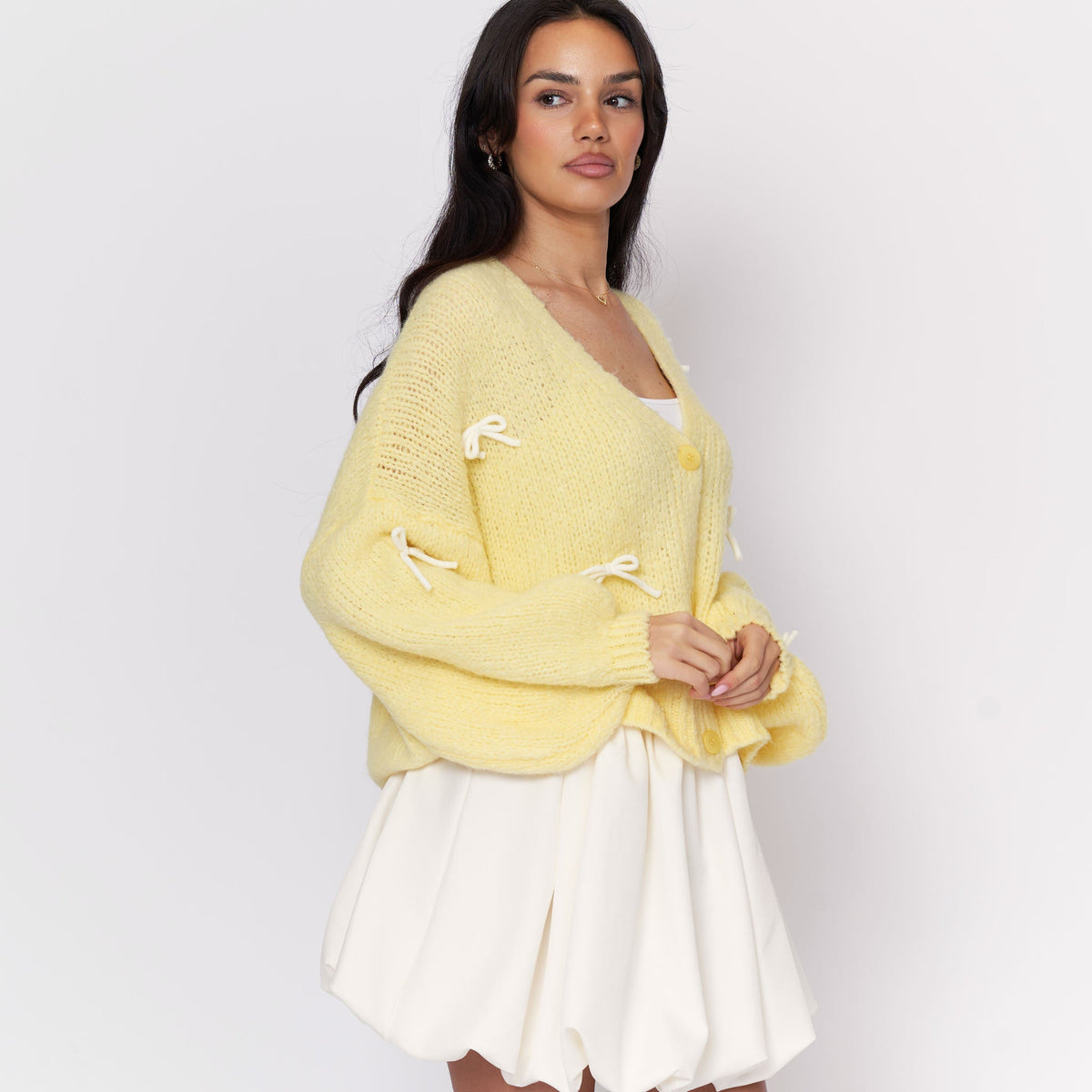 Cleo | Cárdigan oversize con mini lazos