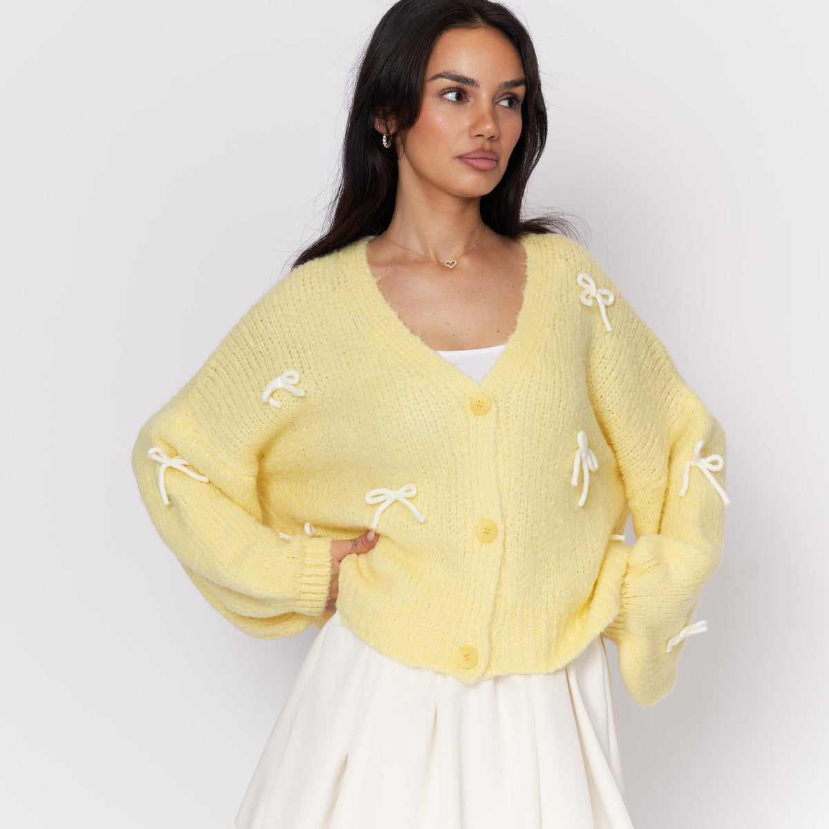 Cleo | Cárdigan oversize con mini lazos