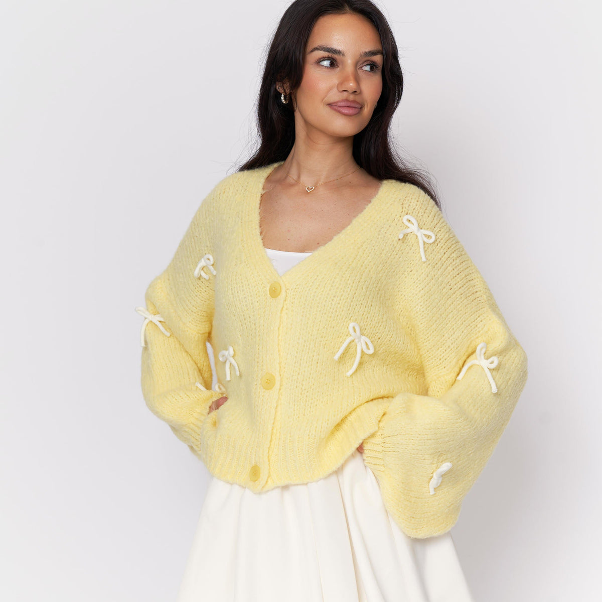 Cleo | Cárdigan oversize con mini lazos