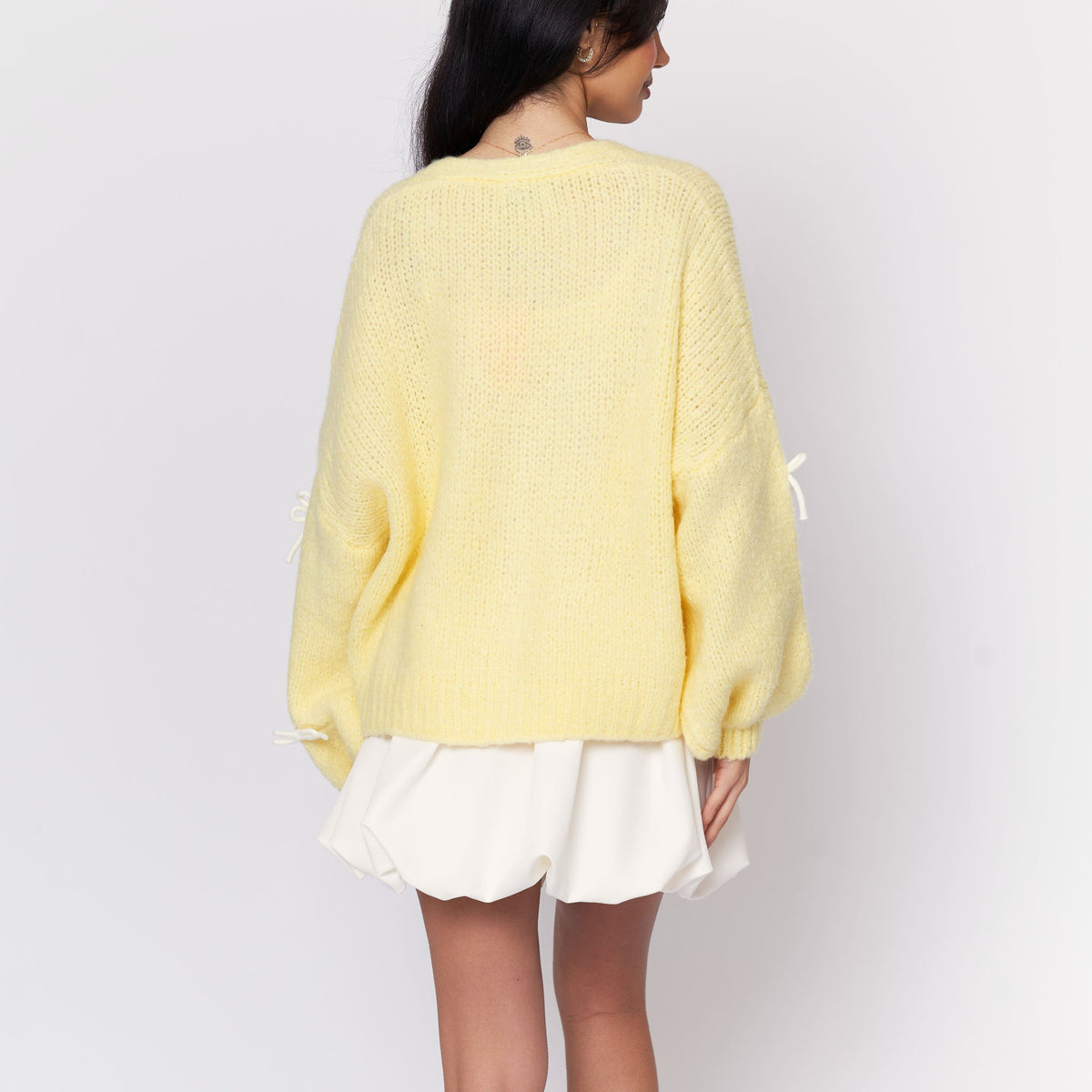 Cleo | Cárdigan oversize con mini lazos