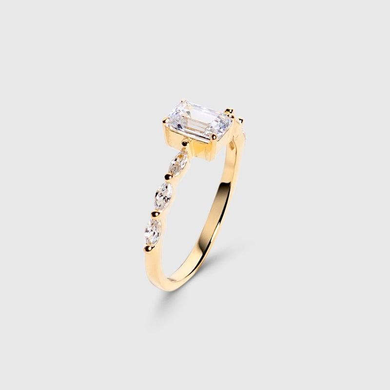 Victoria | Anillo con piedra rectangular y pedrería lateral